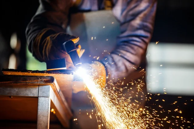 Industrial welding and metal fabrication in progress