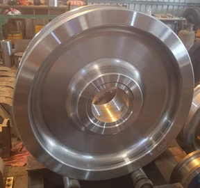 Circular industrial wheel component being machined